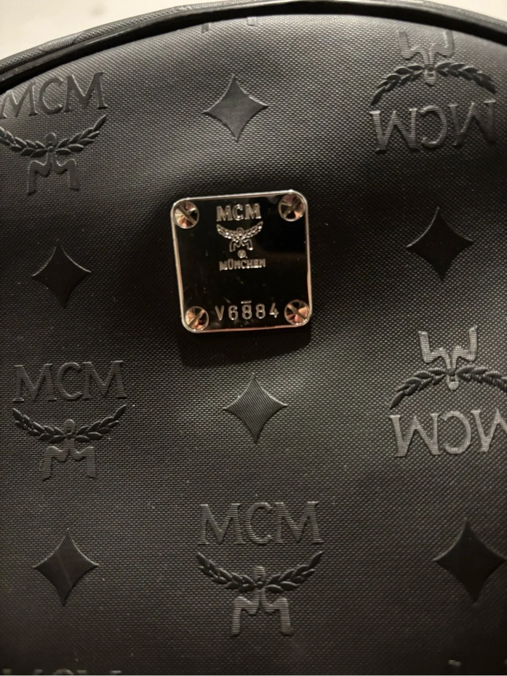 MCM Bionic Black Logo Backpack with Graphic Front Pocket
